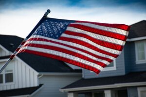 A flying American flag. Depicting how nonprofits are responding to economic uncertainty